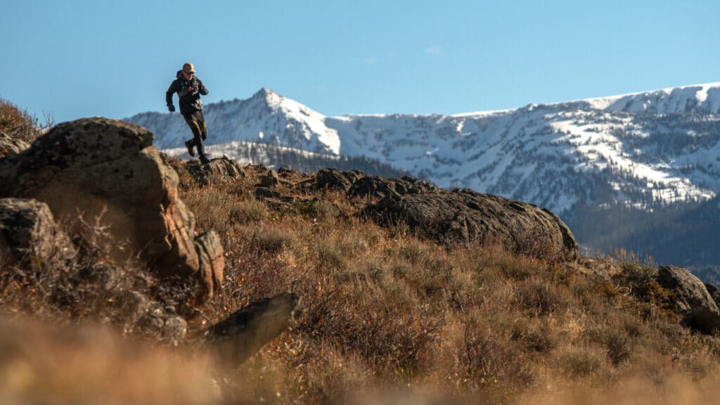 Pat Rodgers Running with Mount Zirkel Wilderness in Background