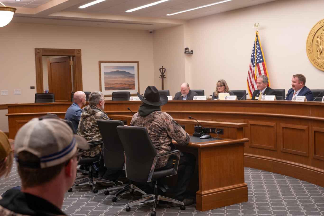 Camo at the Capitol participants testify at a committee hearing.